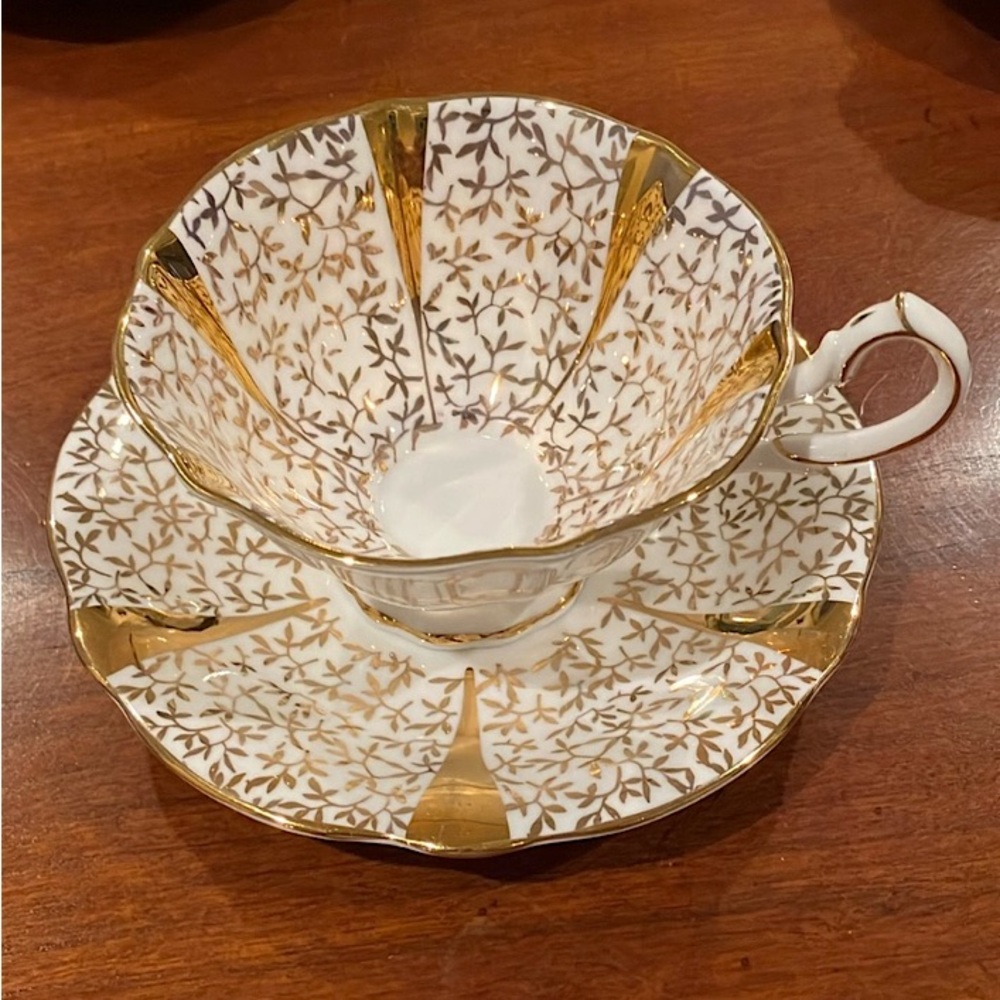 Queen Anne vintage tea cup & saucer, gold filigree pattern on white “Gold Lace”
